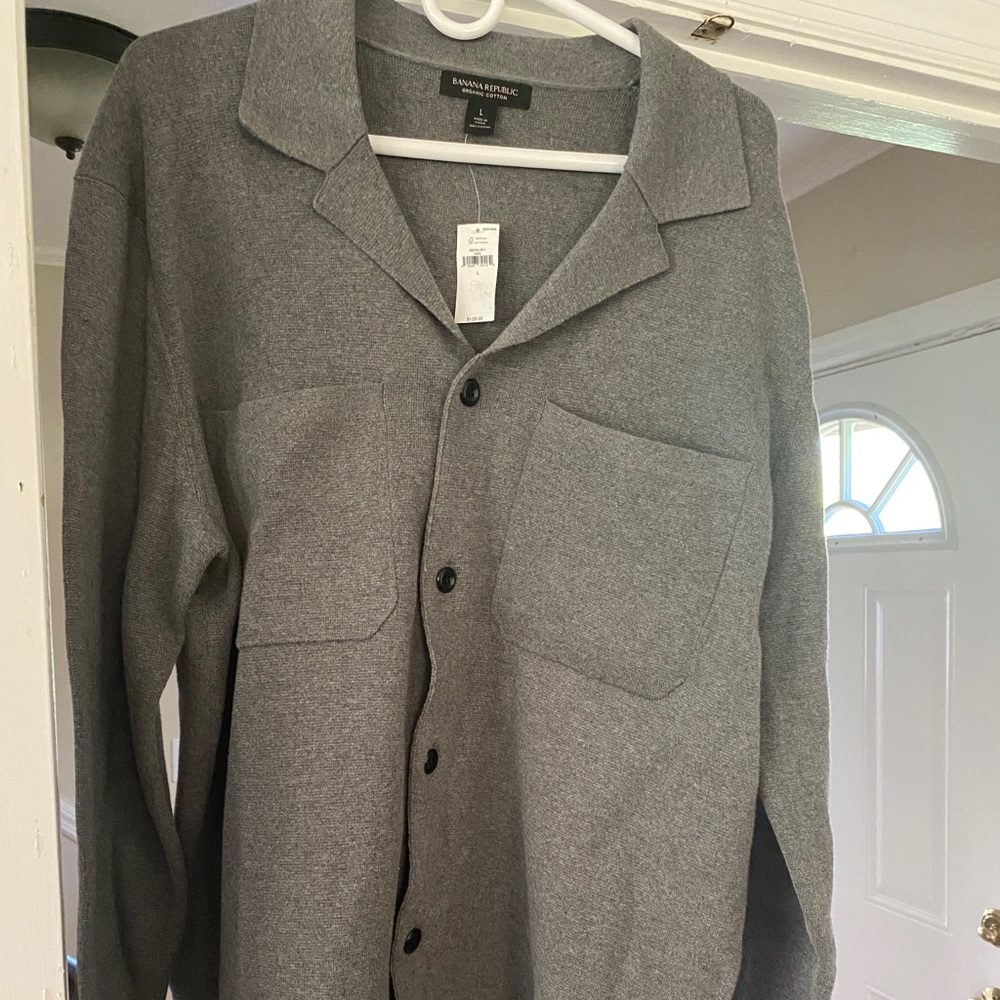 NWT, button up sweatshirt/shirt. Never worn.